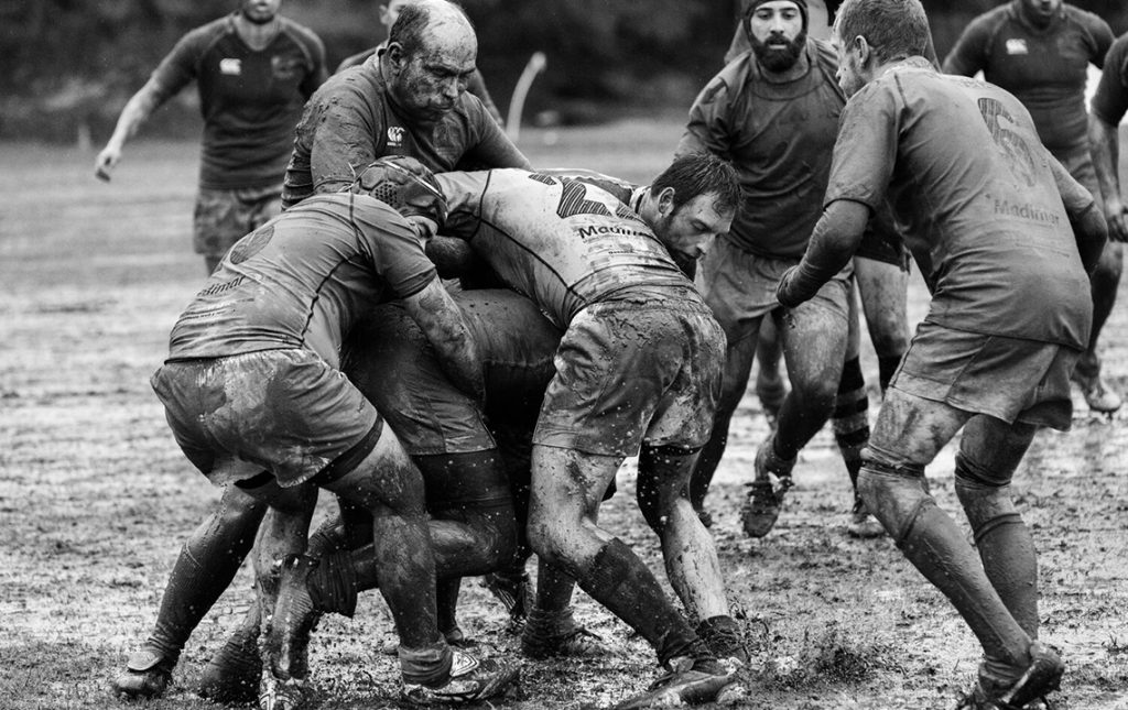 Muddy Rugby Players